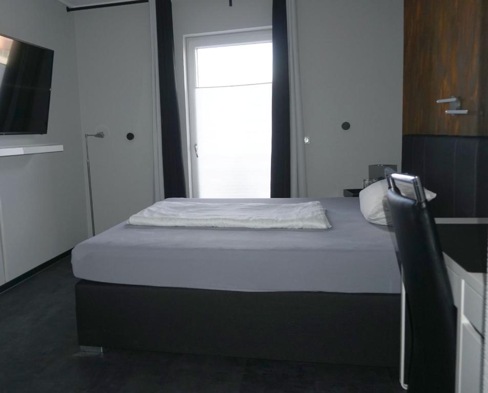 Postel nebo postele na pokoji v ubytování Hotel Come In