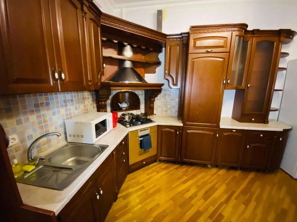 Kuchyň nebo kuchyňský kout v ubytování Real Home Apartments in Kiev Center