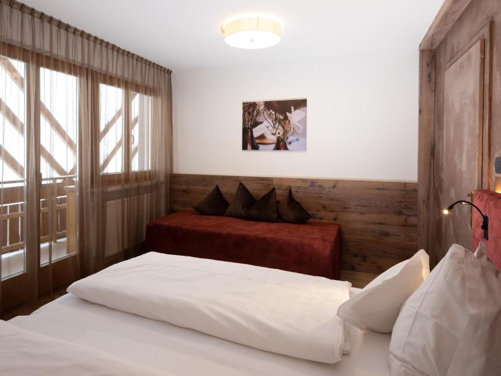 Postel nebo postele na pokoji v ubytování Residence Iris