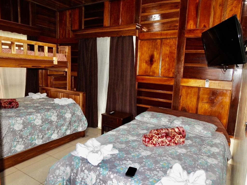 Postel nebo postele na pokoji v ubytování Las Pavitas Cottages