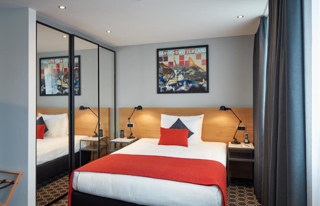 Postel nebo postele na pokoji v ubytování Hard Rock Hotel Davos