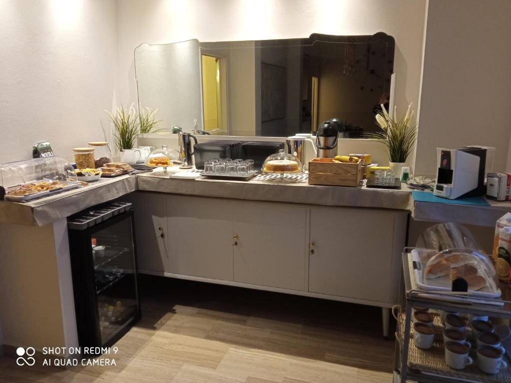 Kuchyň nebo kuchyňský kout v ubytování Ad Astra Rooms