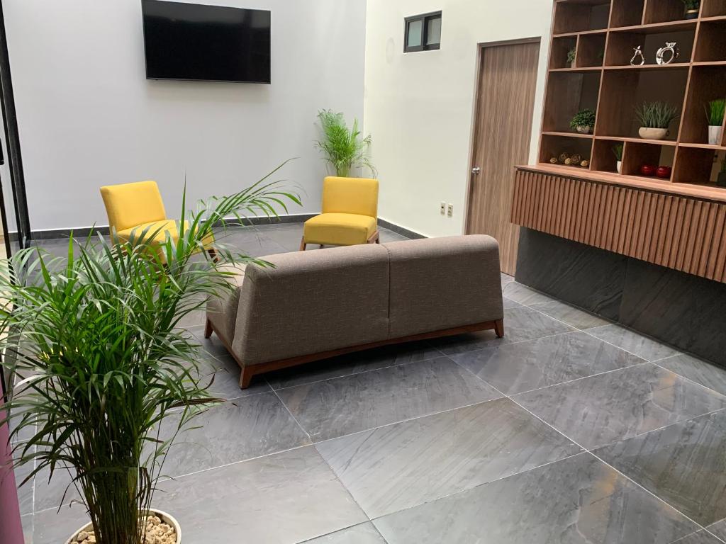 TV a/nebo společenská místnost v ubytování Hotel Luma by Kavia