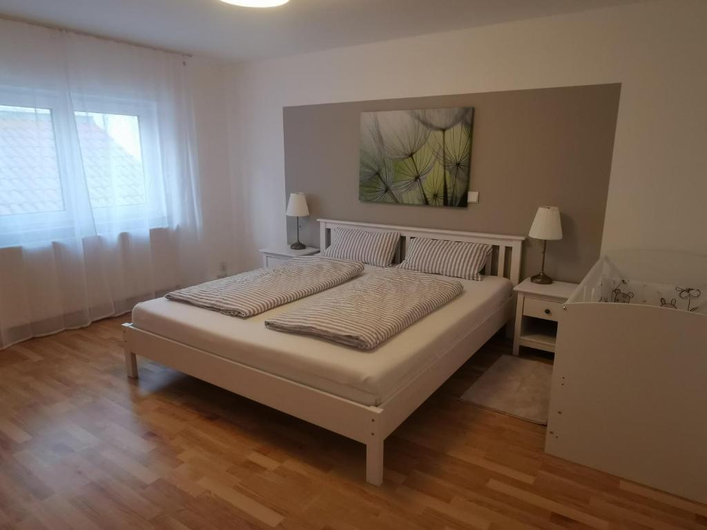 Postel nebo postele na pokoji v ubytování Top Unterkunft in der Pfalz