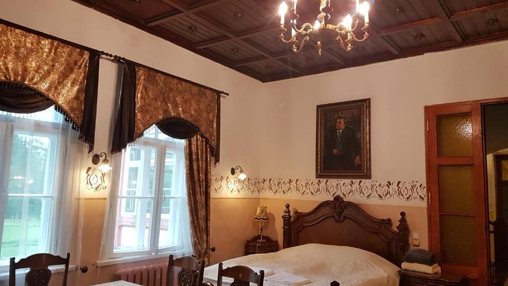 Postel nebo postele na pokoji v ubytování Cantervilla Castle