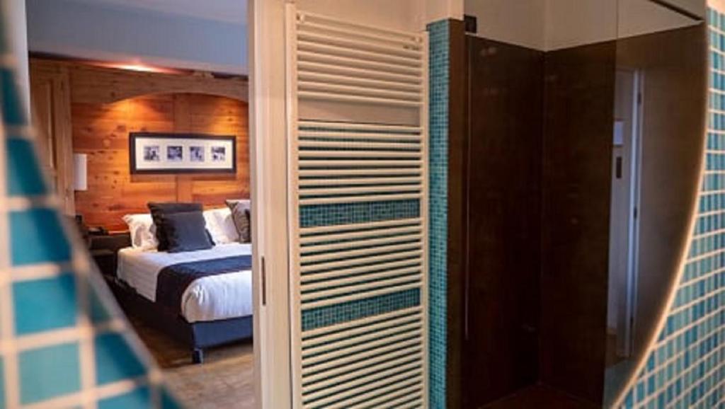 Postel nebo postele na pokoji v ubytování Chaberton Lodge & Spa