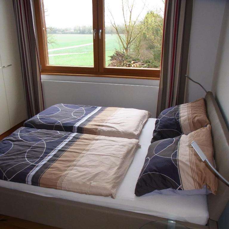 Postel nebo postele na pokoji v ubytování Ferienwohnung Siloblick