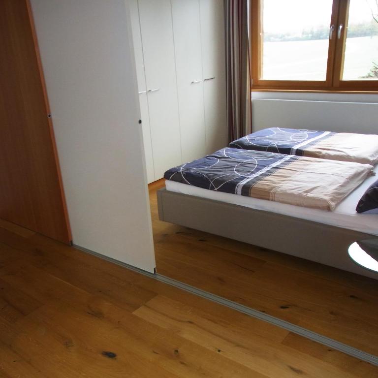 Postel nebo postele na pokoji v ubytování Ferienwohnung Siloblick