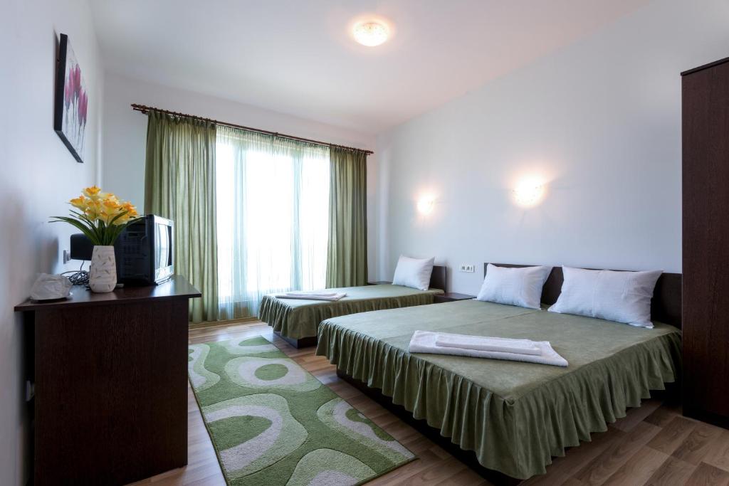 Letto o letti in una camera di Pensiunea Zbor