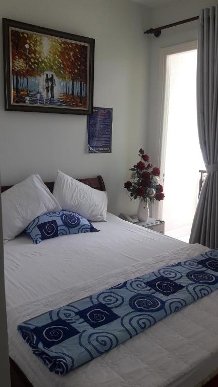 Postel nebo postele na pokoji v ubytování Hotel Khoa Văn