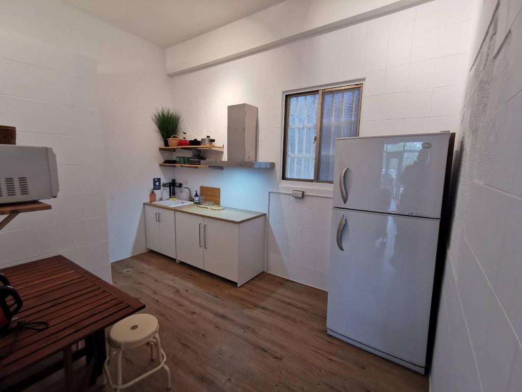 Kuchyň nebo kuchyňský kout v ubytování Oasis Inn
