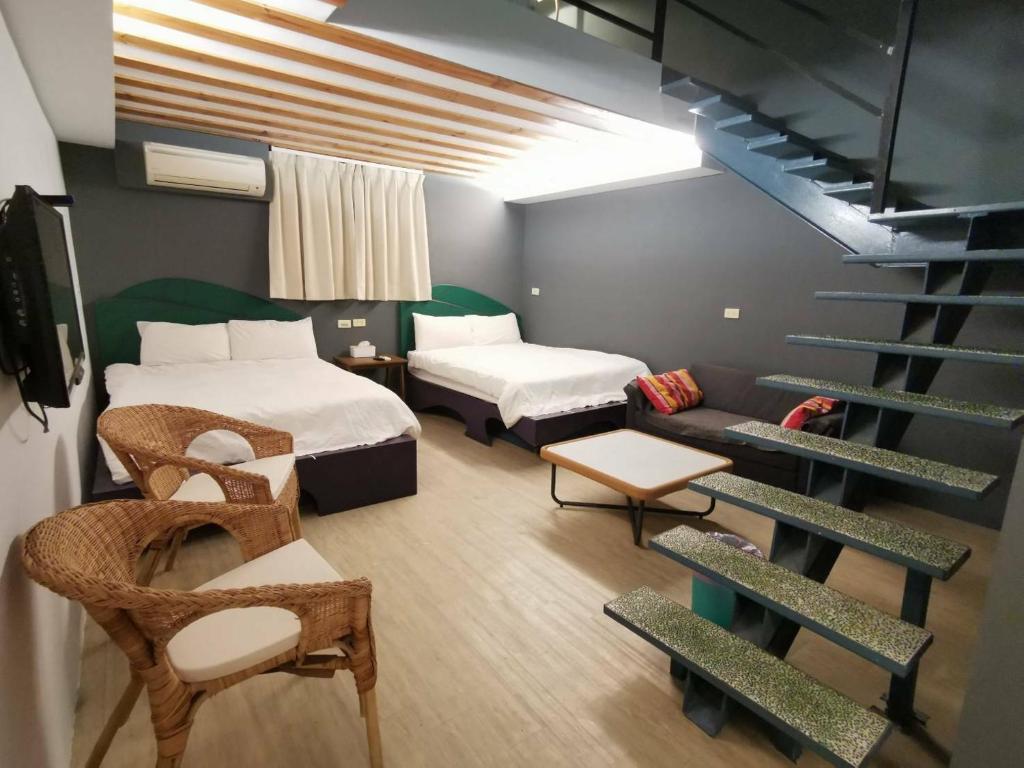 Postel nebo postele na pokoji v ubytování Oasis Inn