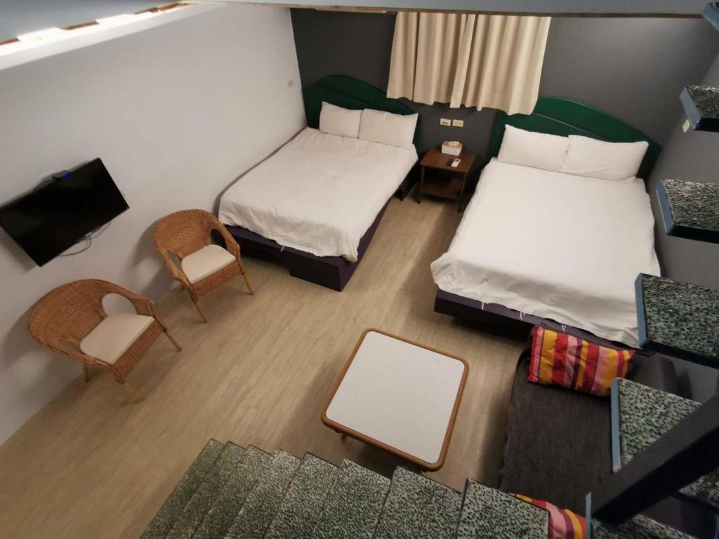 Postel nebo postele na pokoji v ubytování Oasis Inn