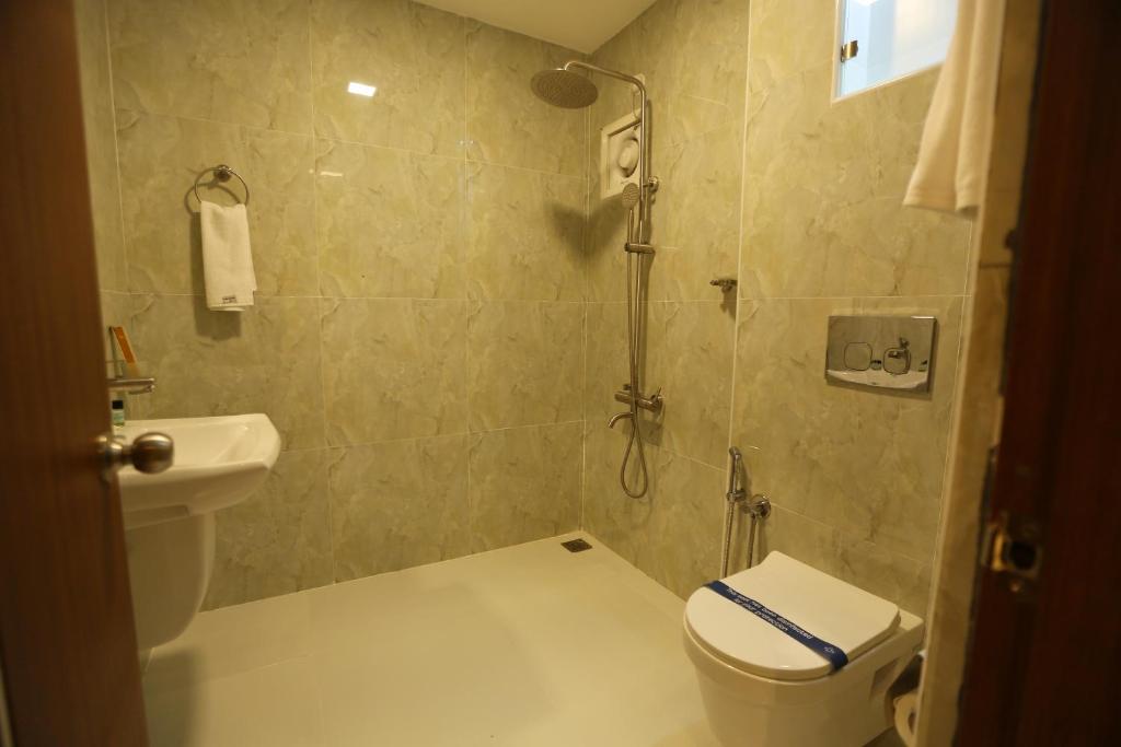 Koupelna v ubytování Mehar Inn Hotel