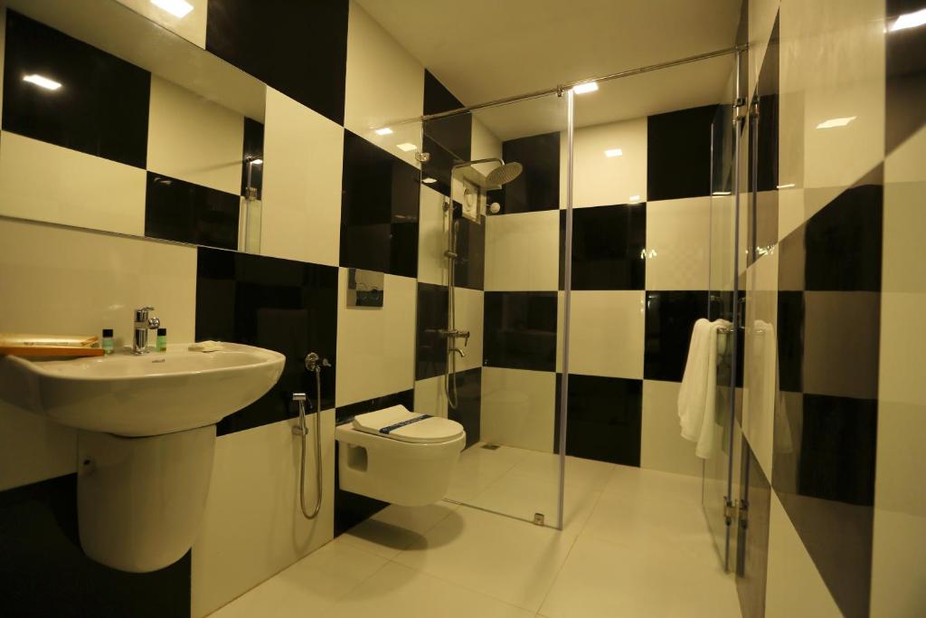 Koupelna v ubytování Mehar Inn Hotel