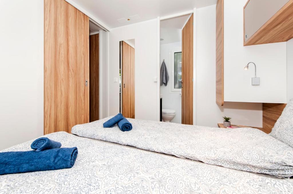 Posteľ alebo postele v izbe v ubytovaní FantaSea Mobile Home Porton Biondi