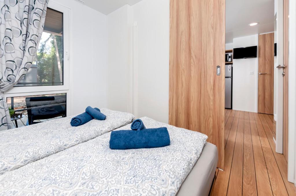 Posteľ alebo postele v izbe v ubytovaní FantaSea Mobile Home Porton Biondi