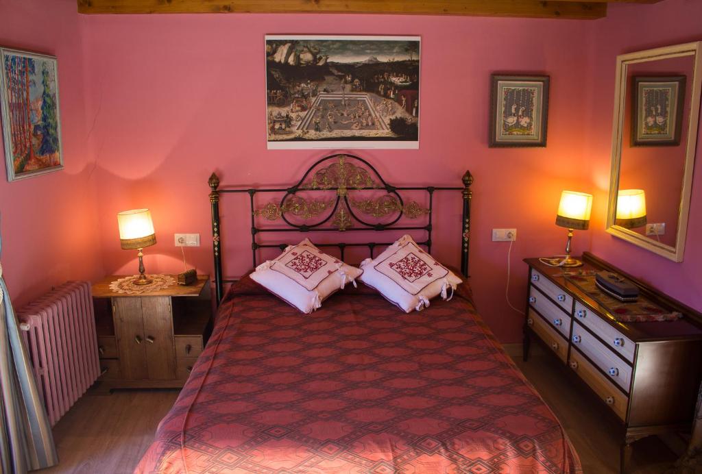Postel nebo postele na pokoji v ubytování CASA CASTAÑÉ