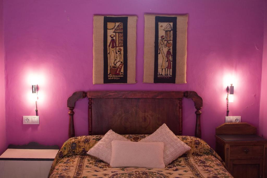 Postel nebo postele na pokoji v ubytování CASA CASTAÑÉ