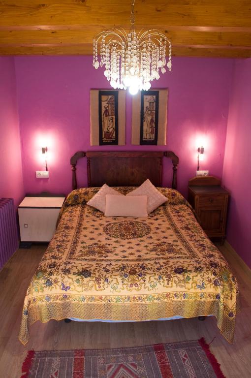 Postel nebo postele na pokoji v ubytování CASA CASTAÑÉ