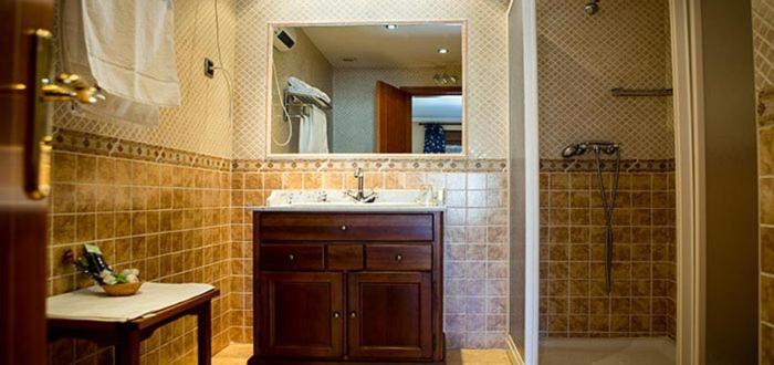 Ванная комната в Hotel Rural El Jardin