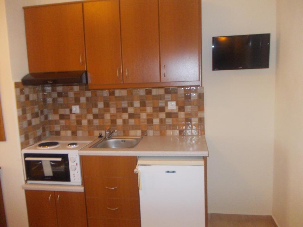 Kuchyň nebo kuchyňský kout v ubytování Maistrali Studios & Apartments