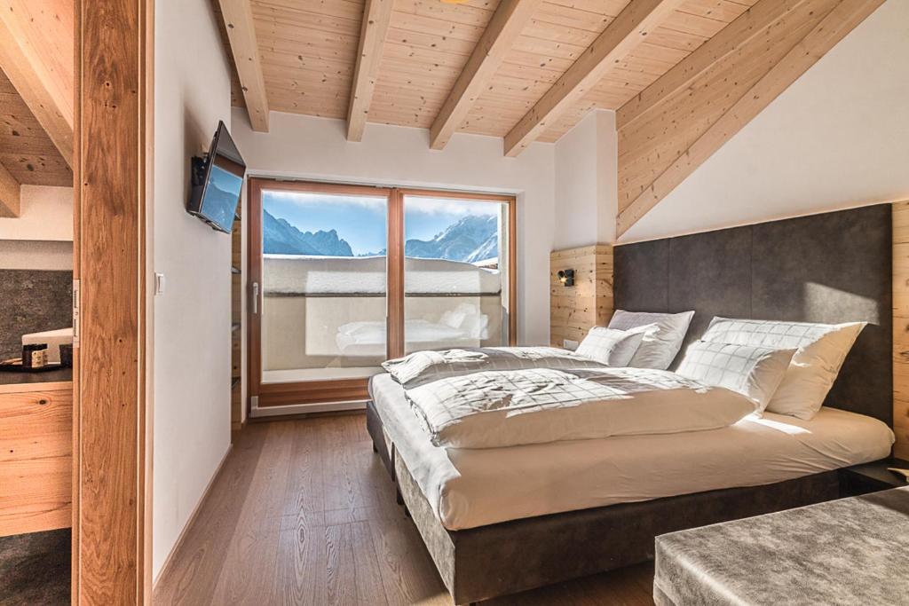 Postel nebo postele na pokoji v ubytování Bellavista Apartment