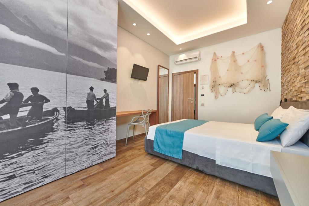 Postel nebo postele na pokoji v ubytování Hotel Al Rio Se