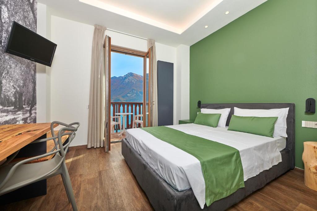 Postel nebo postele na pokoji v ubytování Hotel Al Rio Se