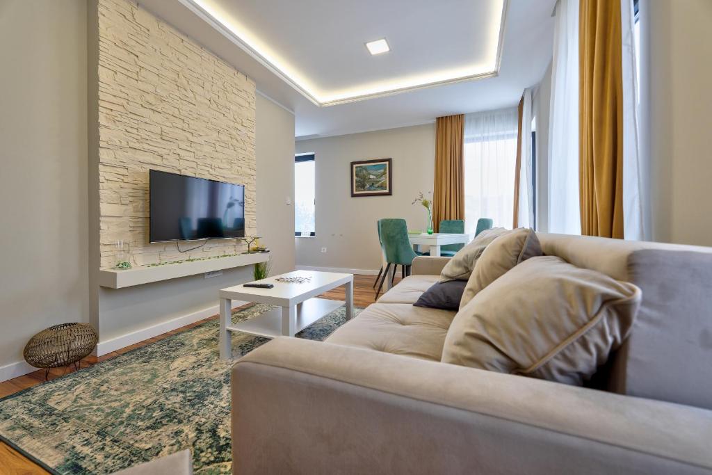 TV a/nebo společenská místnost v ubytování Onix Residence