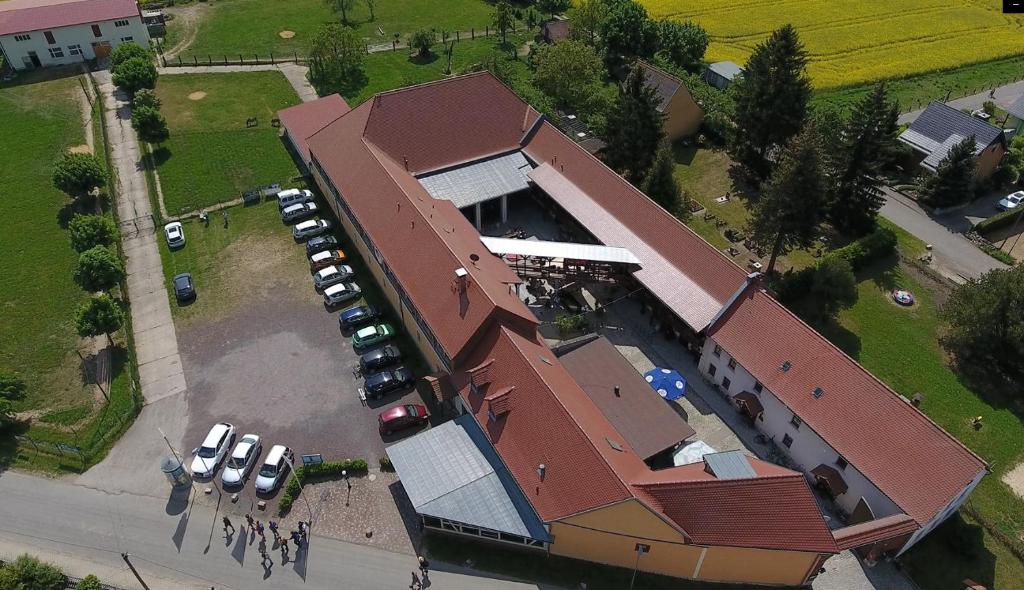 an overhead view of a building with a parking lot at Hotel Sonnekalb in Naumburg