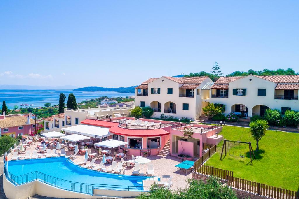 an aerial view of a resort with a swimming pool at CORFU PELAGOS HOTEL in Moraitika