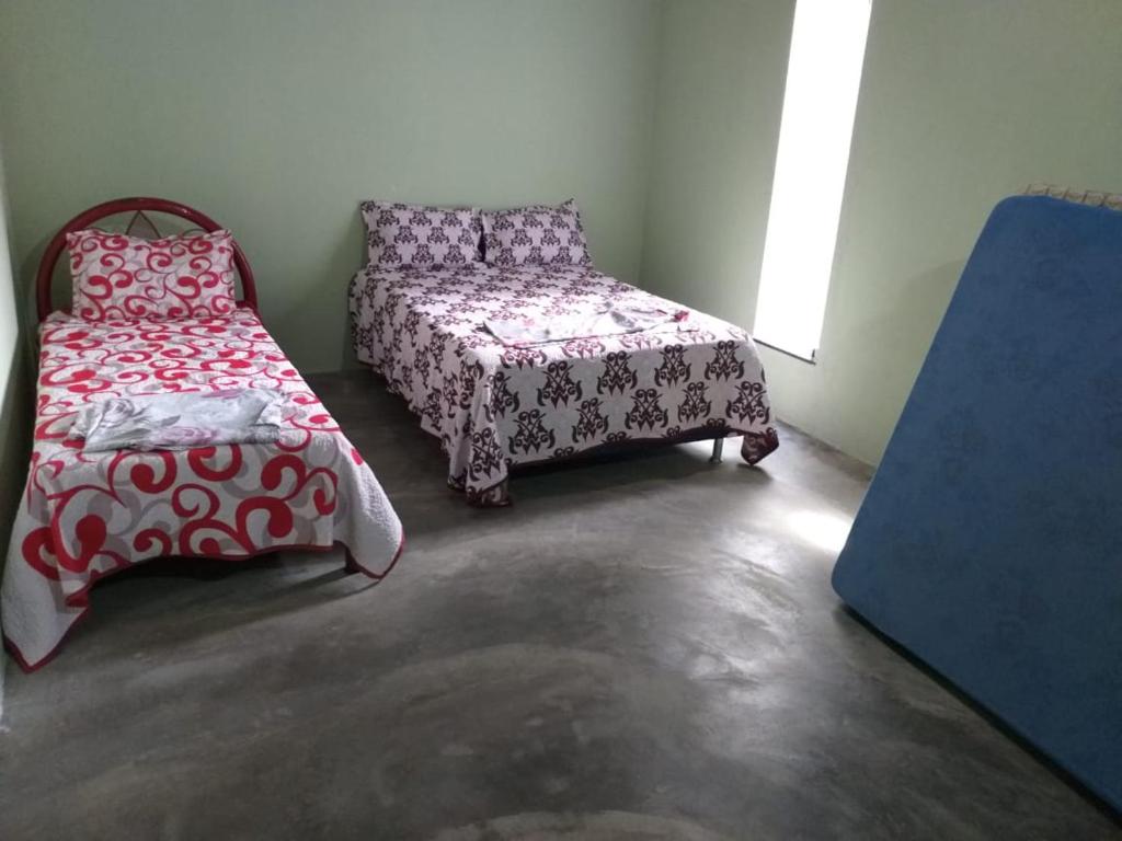 Postel nebo postele na pokoji v ubytování CASA DE PRAIA GIOVANI