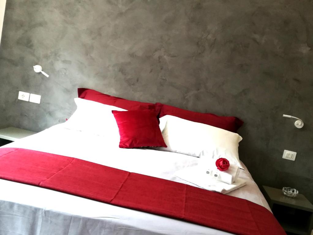 Postel nebo postele na pokoji v ubytování Casa Orrù