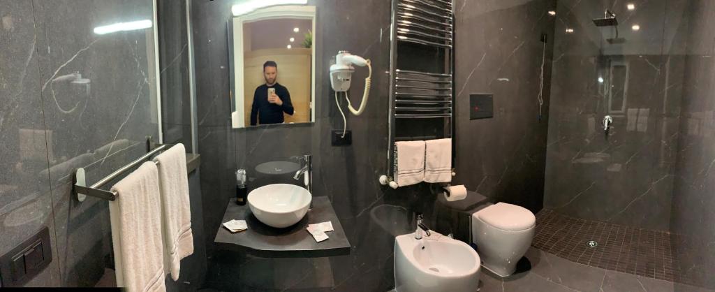 Koupelna v ubytování Hotel Elite
