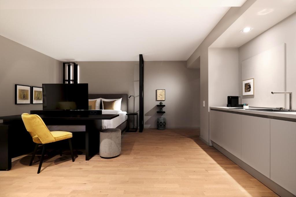 Kuchyň nebo kuchyňský kout v ubytování SAXX Hotel "Am Theater Karree"