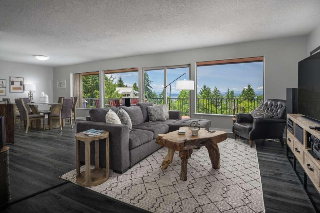 a living room with a couch and a table at Luray Terrace in Portland