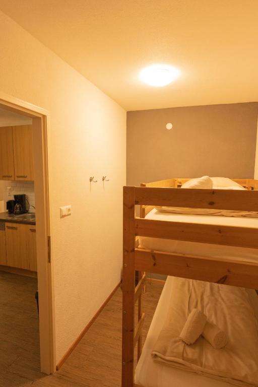 Posteľ alebo postele v izbe v ubytovaní Alex Kaprun Apartment