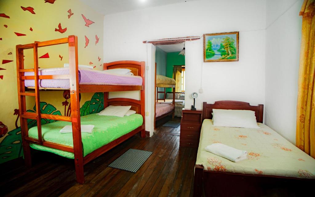 Postel nebo postele na pokoji v ubytování Colonial House Inn