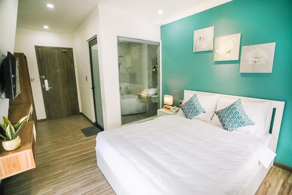 Postel nebo postele na pokoji v ubytování Memory Inn - Green Villa