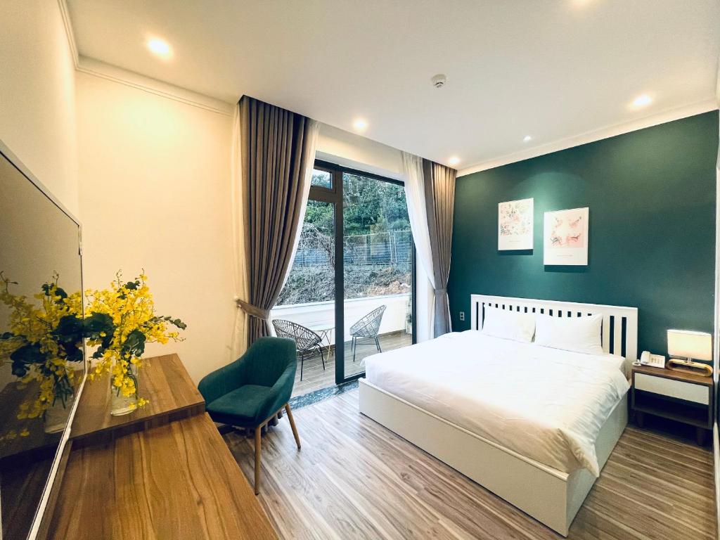 Postel nebo postele na pokoji v ubytování Memory Inn - Green Villa