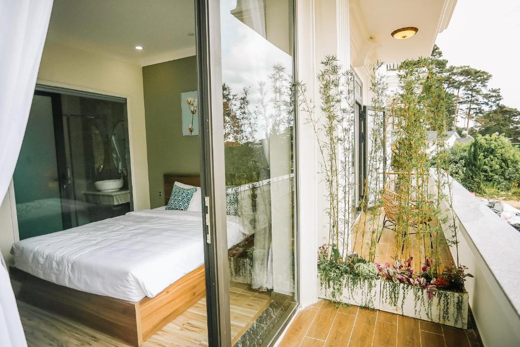 Postel nebo postele na pokoji v ubytování Memory Inn - Green Villa