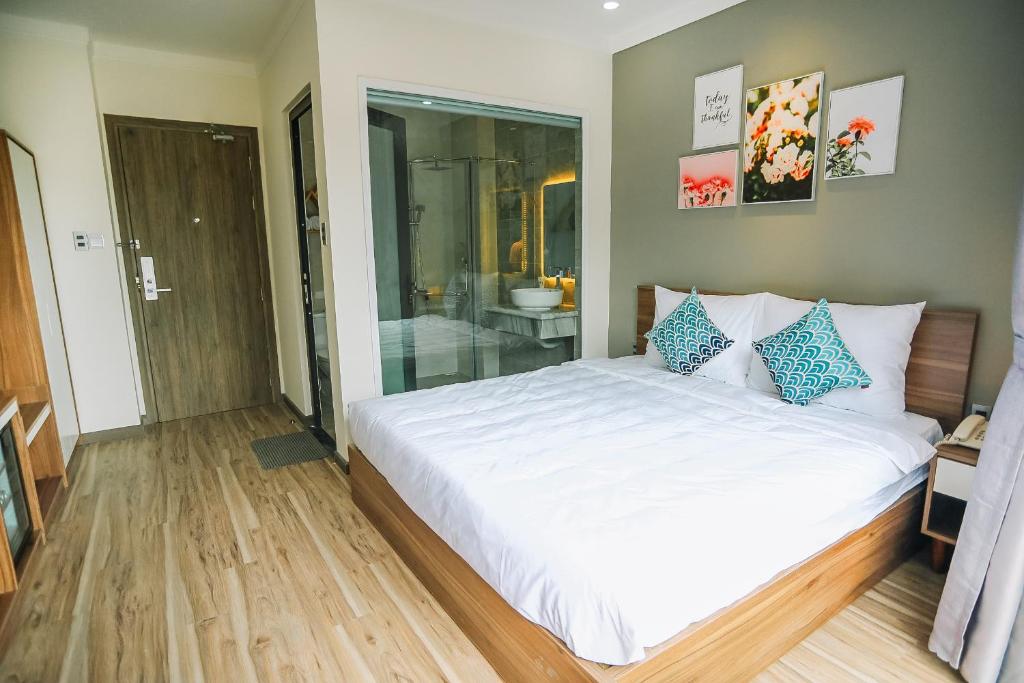 Postel nebo postele na pokoji v ubytování Memory Inn - Green Villa