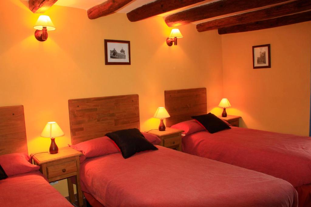 Postel nebo postele na pokoji v ubytování Casa Bestregui