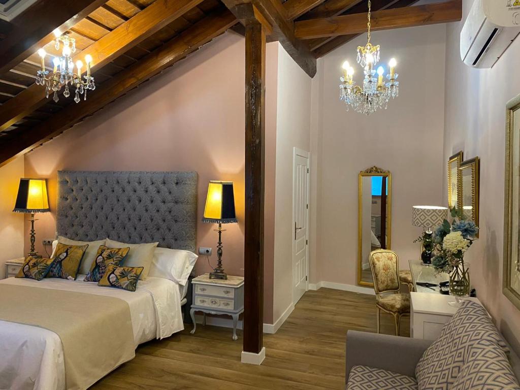 Ліжко або ліжка в номері HOTEL CASABLANCA BOUTIQUE