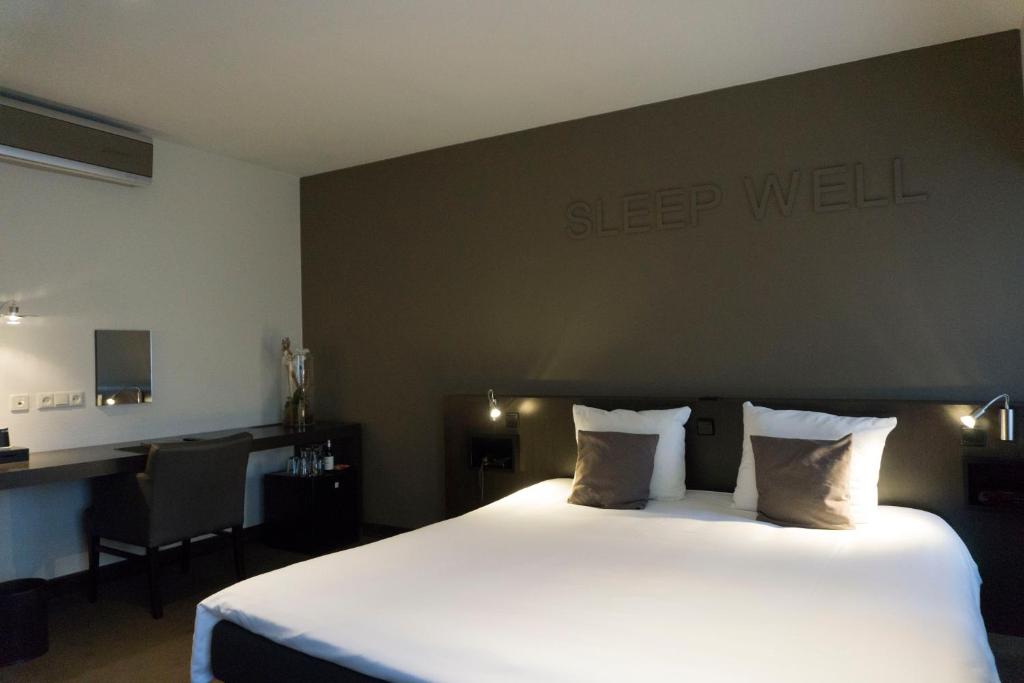 Postel nebo postele na pokoji v ubytování Hotel Central