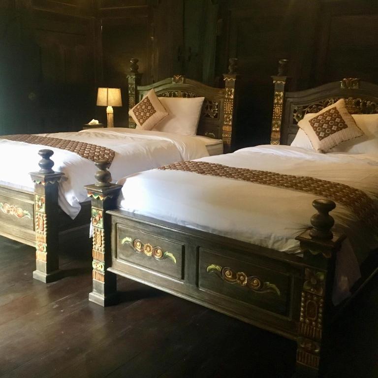 Postel nebo postele na pokoji v ubytování Alas Arum Ecolodge
