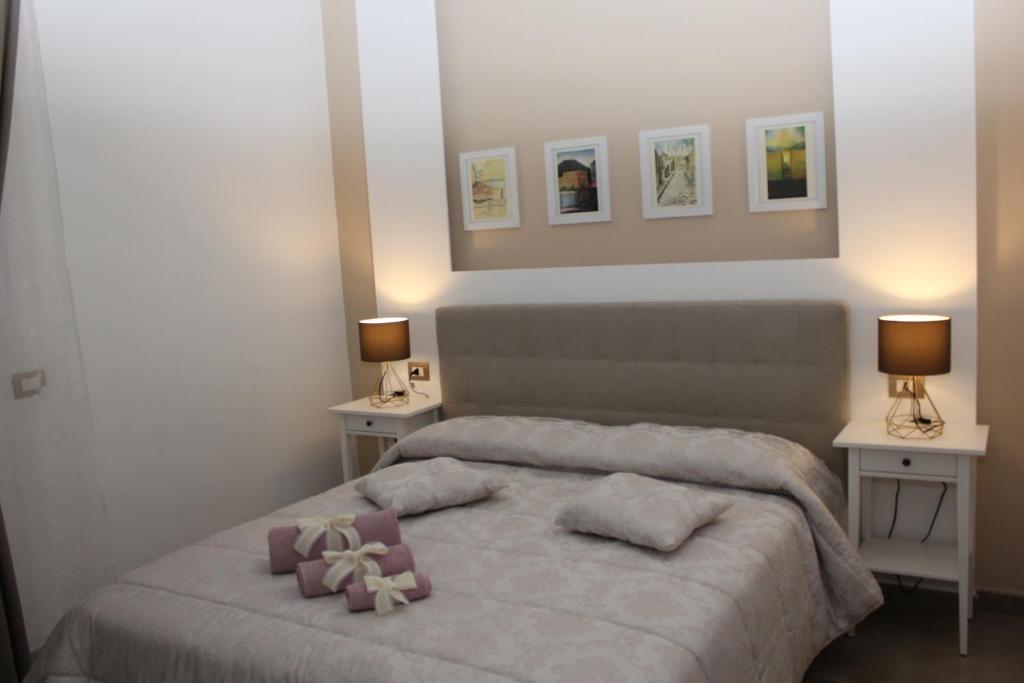 Postel nebo postele na pokoji v ubytování B&B 80056 Ercolano