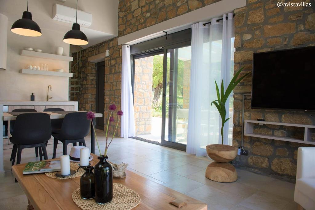Televízia a/alebo spoločenská miestnosť v ubytovaní Avista Private Resort