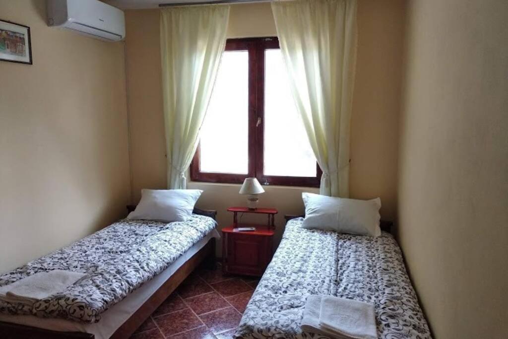 Postel nebo postele na pokoji v ubytování Guesthouse Oasis-Shabla